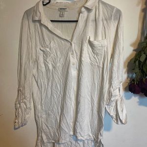 White, mid length sleeved Old Navy women’s shirt.